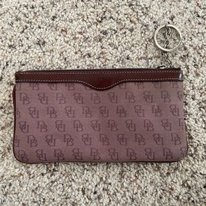 Mauve Dooney and Bourke wristlet